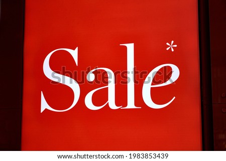 Signboard sale. Russian language sale. Discounts up to 70 percent.