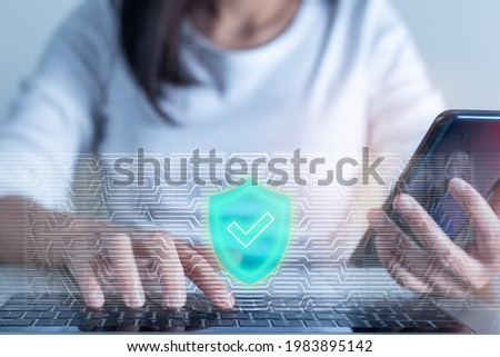 Woman hand enter a one time password for the validation process on laptop, Mobile OTP secure Verification Method, 2-Step authentication web page, Concept cyber security safe data protection business. Royalty-Free Stock Photo #1983895142