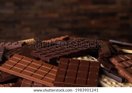 Pile of chocolate bars, sweet food background