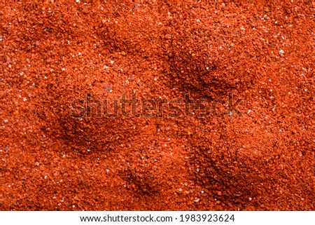 Pile of red cayenne pepper texture for background, Chili flakes, Chili powder Royalty-Free Stock Photo #1983923624