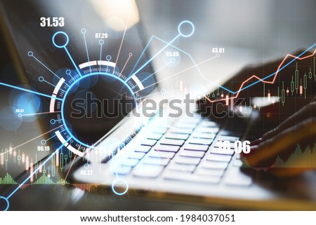 Close up of hands using laptop with abstract digital business forex chart. Trade concept. Double exposure High quality photo