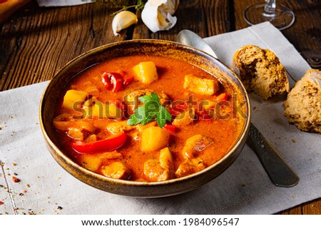 rustic Hungarian goulash soup with paprika Royalty-Free Stock Photo #1984096547