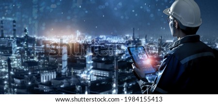 Smart industry 4.0 technology concept, engineer using data and control networking for sustainable energy, sustainable development, energy saving, increase productivity and  efficiency management  Royalty-Free Stock Photo #1984155413