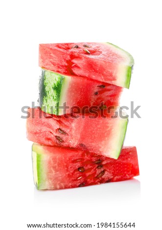 Ripe juicy watermelon pieces isolated on white background.