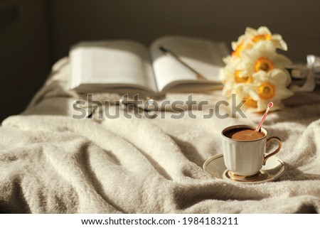 Fresh coffee in the bed. Good morning concept.