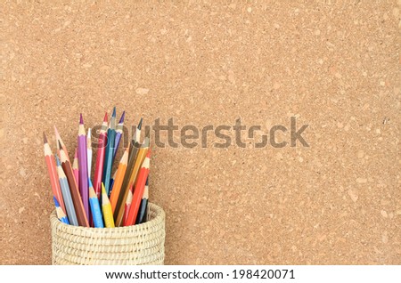 A cork board with color pencil 