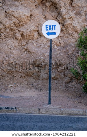 Road sign exit on the street of Egypt in Sharm El Sheikh, close up