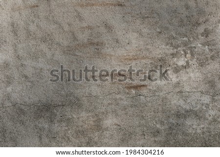 Gray cement plaster wall as background or texture