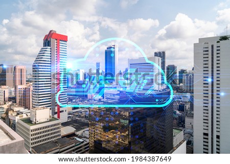 Storage cloud hologram over panorama city view of Bangkok, tech hub in Asia. The concept of developing new approaches to store digital information. Double exposure.