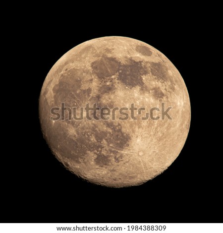 Moon on a background of blue sky.