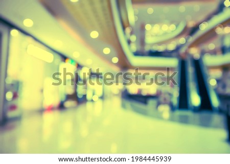 Shopping mall or department store with blurred background and bokeh light.