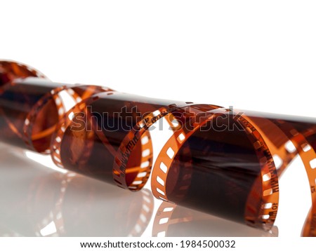 negative in black-and-white and color photography and cinematography formed by grains of metallic silver image of the subject, film isolated on a white background, analog photography