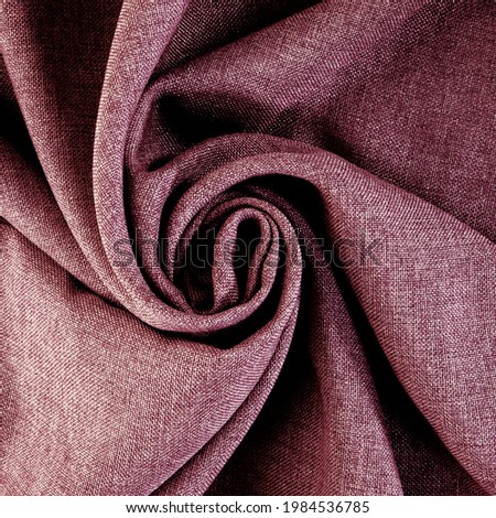 Cloth. Folds of fabric twisted in a circle. Background for design and presentation.