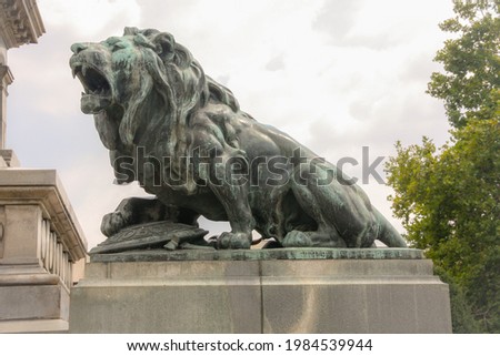 The bronze roaring lion defending the Shield of Freedom, Monument of Freedom, Ruse, Bulgaria Royalty-Free Stock Photo #1984539944