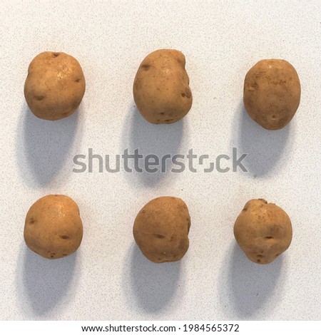 A picture of six potatoes