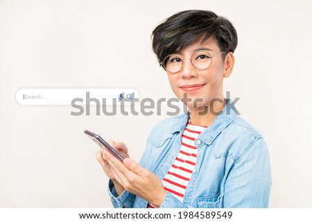 Search Engine Optimization - SEO concept. Portrait of a beautiful middle-aged asian woman using a smartphone. Search graphic,  Machine learning, AI Artificial intelligence, Keyword, Lifestyle, Modern.