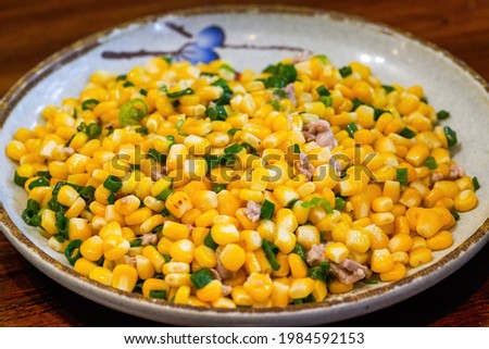 A delicious Chinese dish, fried corn with minced meat