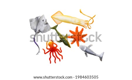 Toys of various sea animals on a white background