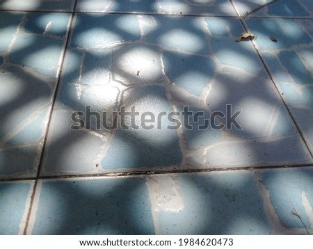Grid shadows on the floor