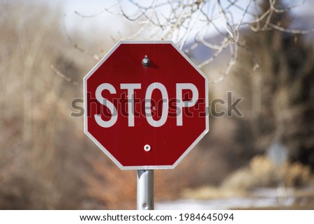 A red warning sign saying stop
