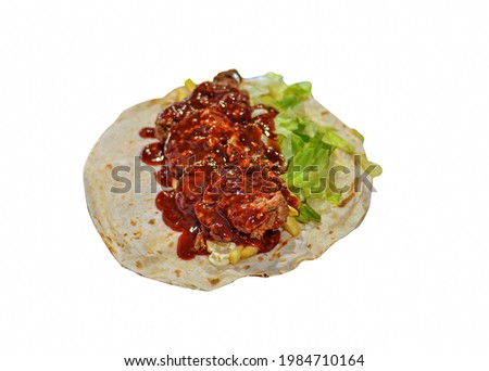 Chicken wrap with chili sauce and vegetables