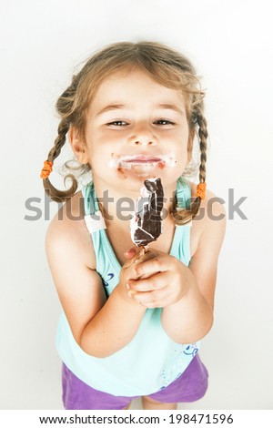 happy kid girl eating ice cream 