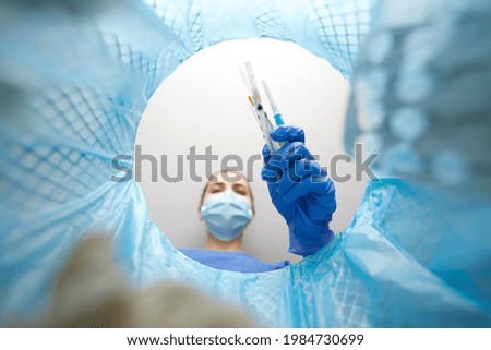 recycling, waste sorting and sustainability concept - doctor or healthcare worker in gloves throwing used syringes into trash can