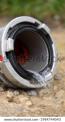 Fire fighter Pipe with water comming out