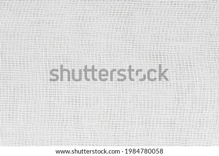 Background Texture of white medical bandage. cheesecloth texture Royalty-Free Stock Photo #1984780058