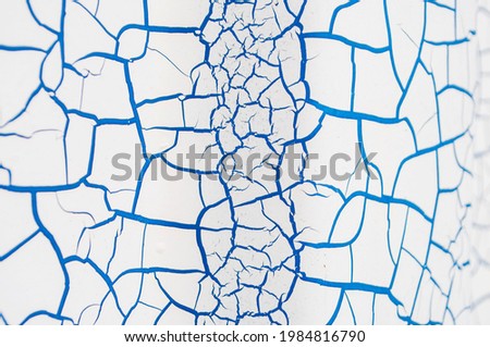 blue abstract pattern on white metal surface
