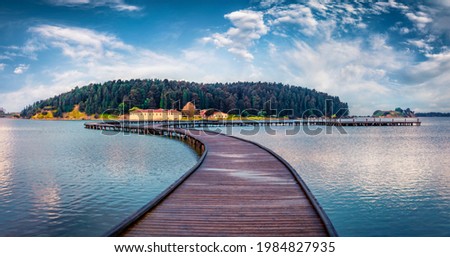 Splendid morning view of St Mary's Monastery. Picturesque spring seascape of Narta Lagoon. Beautiful outdoor scene of Albania, Europe. Traveling concept background. Royalty-Free Stock Photo #1984827935