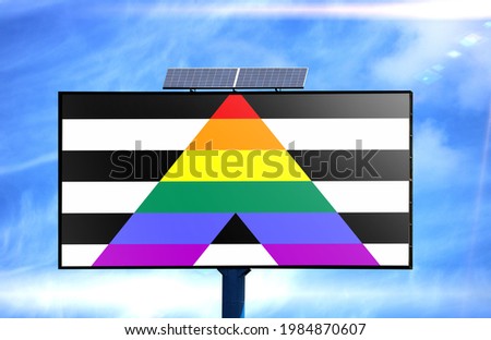 Billboard with Straight ally flag and solar battery on blue sky background