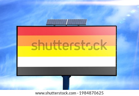 Billboard with Lithsexual flag and solar battery on blue sky background