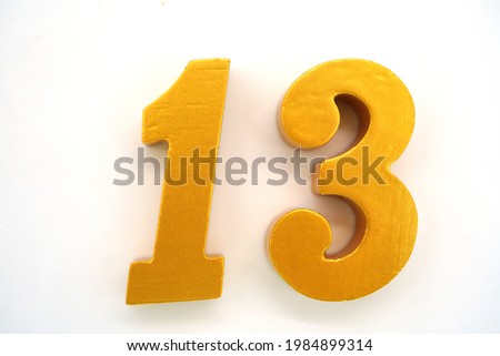   The letters are gold Arabic numerals on a white background.                             