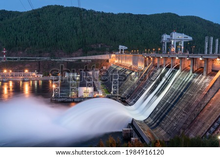 Krasnoyarsk hydroelectric power station-draining water from two locks in the evening to prevent the risk of flooding Royalty-Free Stock Photo #1984916120