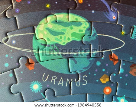 picture of uranus consists of several puzzle pieces