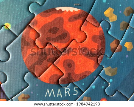 The picture of mars consists of several puzzle pieces