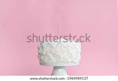 White natural cake with cake topper stick and blank pink background , on cake stand , cake topper mockup