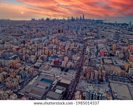 Beautiful Sunset Over The Kuwait City Skyline - Aerial Landscape Shot From Above Hawalli CIty Royalty-Free Stock Photo #1985014337