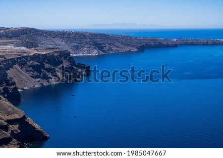 Scenic landscape of caldera view. Santorini island in Greece. Rocks and Aegean sea.