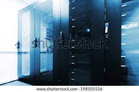 Modern server room interior with black computer cabinets