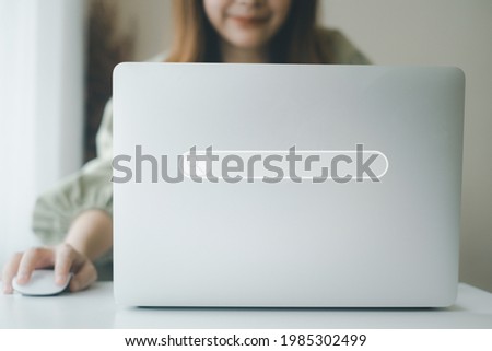 Businessman or student using laptop computer notebook hold mouse for searching, working, online learning, marketing, studying, distance education network online technology background.selective focus.