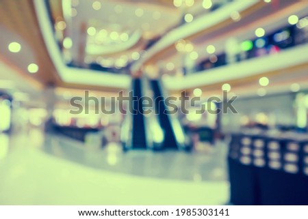 Abstract blur background crowd people in shopping mall for background.