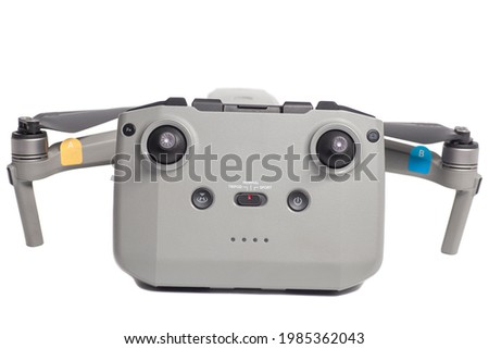 quadcopter drone aerial camera whit remote control isolated on white background.