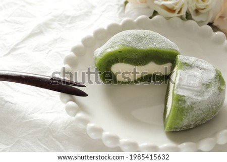Japanese food, green tea and ice cream Daifuku 