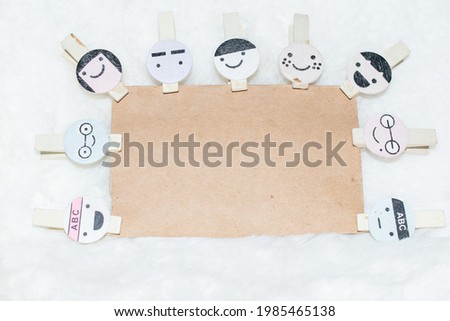 Abstract white wool texture background with cute hairpin brown paper clips
