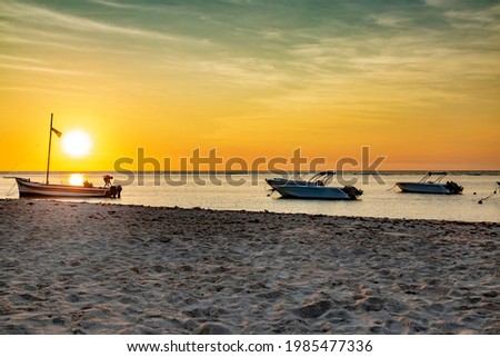 sunset on the beach of Flic en Flac in the west of the republic of Mauritius.