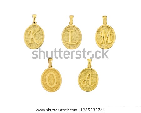 Oval cut gold letters in groups