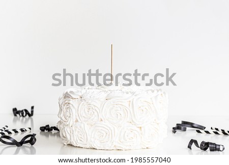 White Cake with cake topper stick and blank white background. Black party supplies ,black white cake topper mock up