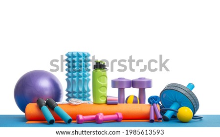 still life of group sports equipment for womens , on white background, isolated. Fitness concept Royalty-Free Stock Photo #1985613593